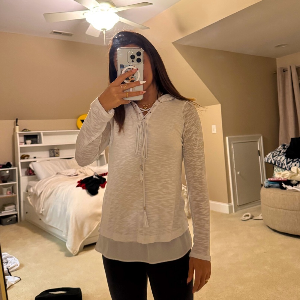 Cute light white sweater jacket. Great condition